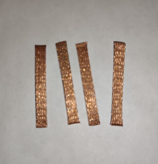 Stírací kartáčky Cu, Balení obsahuje 4 ks. Rozměry cca 3,5 x 0,3 x 25 mm